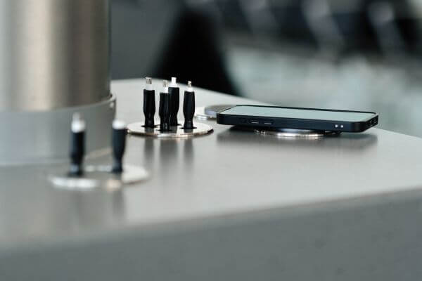 Qi2 wireless charging at Heathrow Airport with Chargebox FastPodium